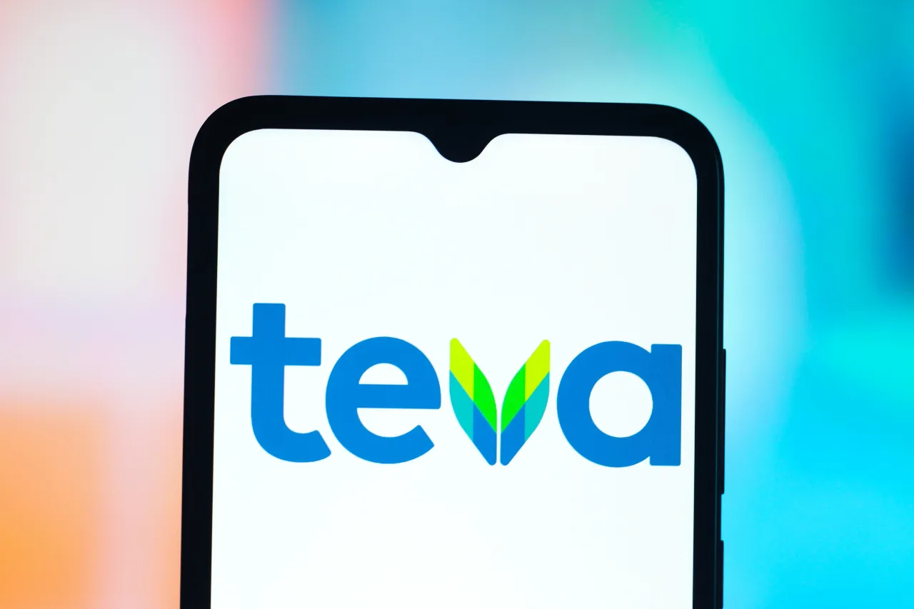 In this photo illustration, the Teva Pharmaceutical Industries logo is seen displayed on a smartphone screen. (Photo Illustration by Thomas Fuller/SOPA Images/LightRocket via Getty Images)