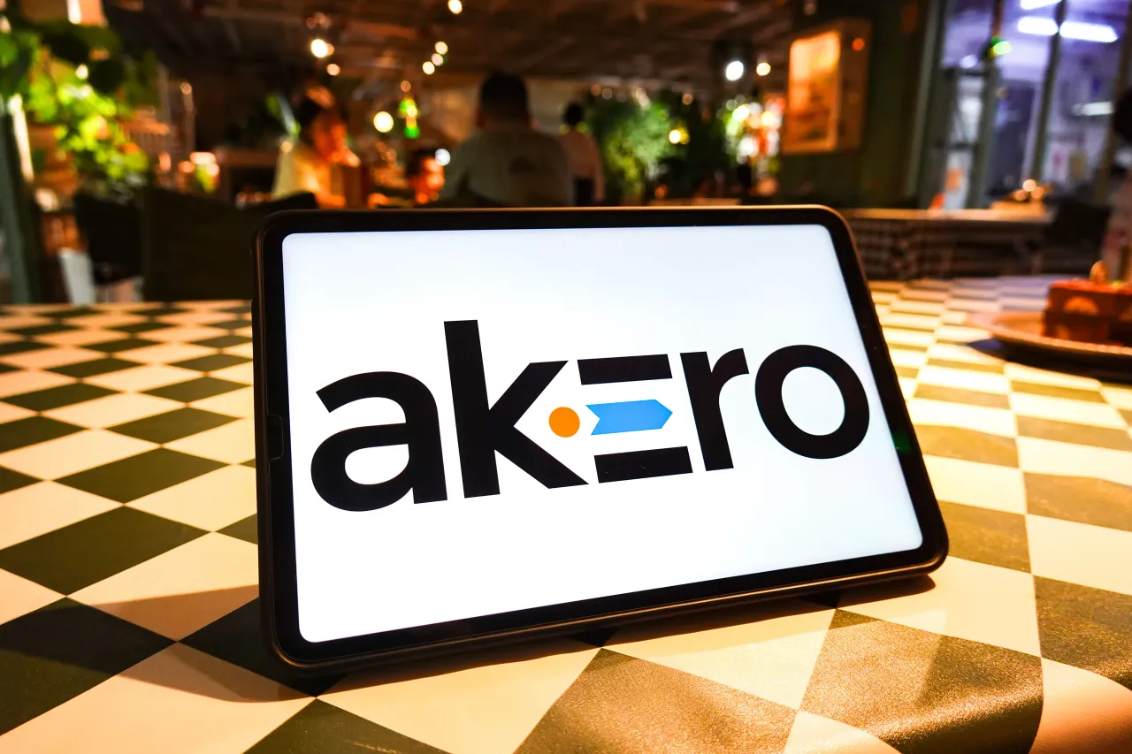 In this photo illustration, the logo of Akero Therapeutics is seen displayed on the screen of a tablet. (Photo Illustration by Sheldon Cooper/SOPA Images/LightRocket via Getty Images)