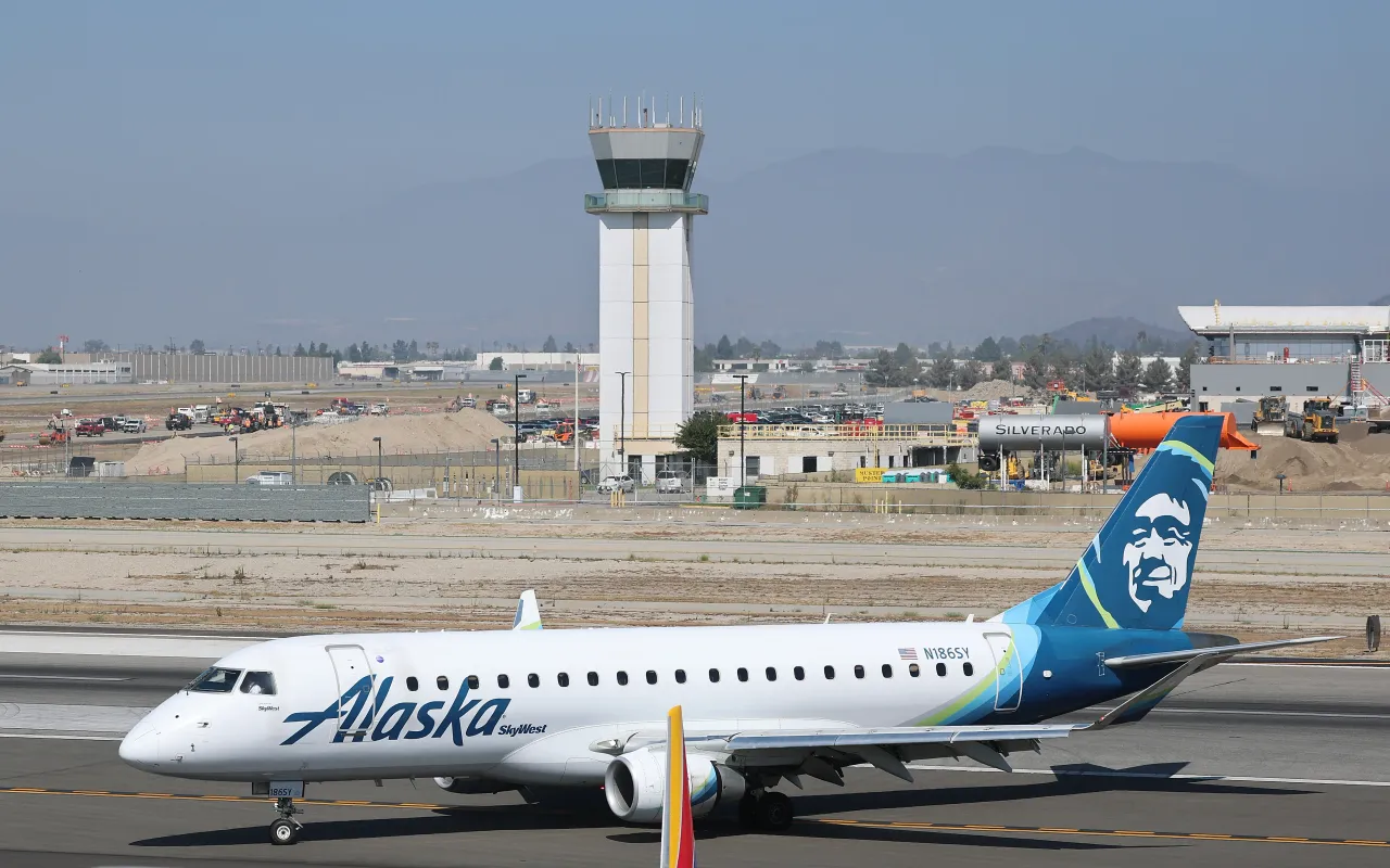 An Alaska Airlines plane taxis to the arrival gate at Hollywood Burbank Airport Tuesday, Oct. 7, 2025. 