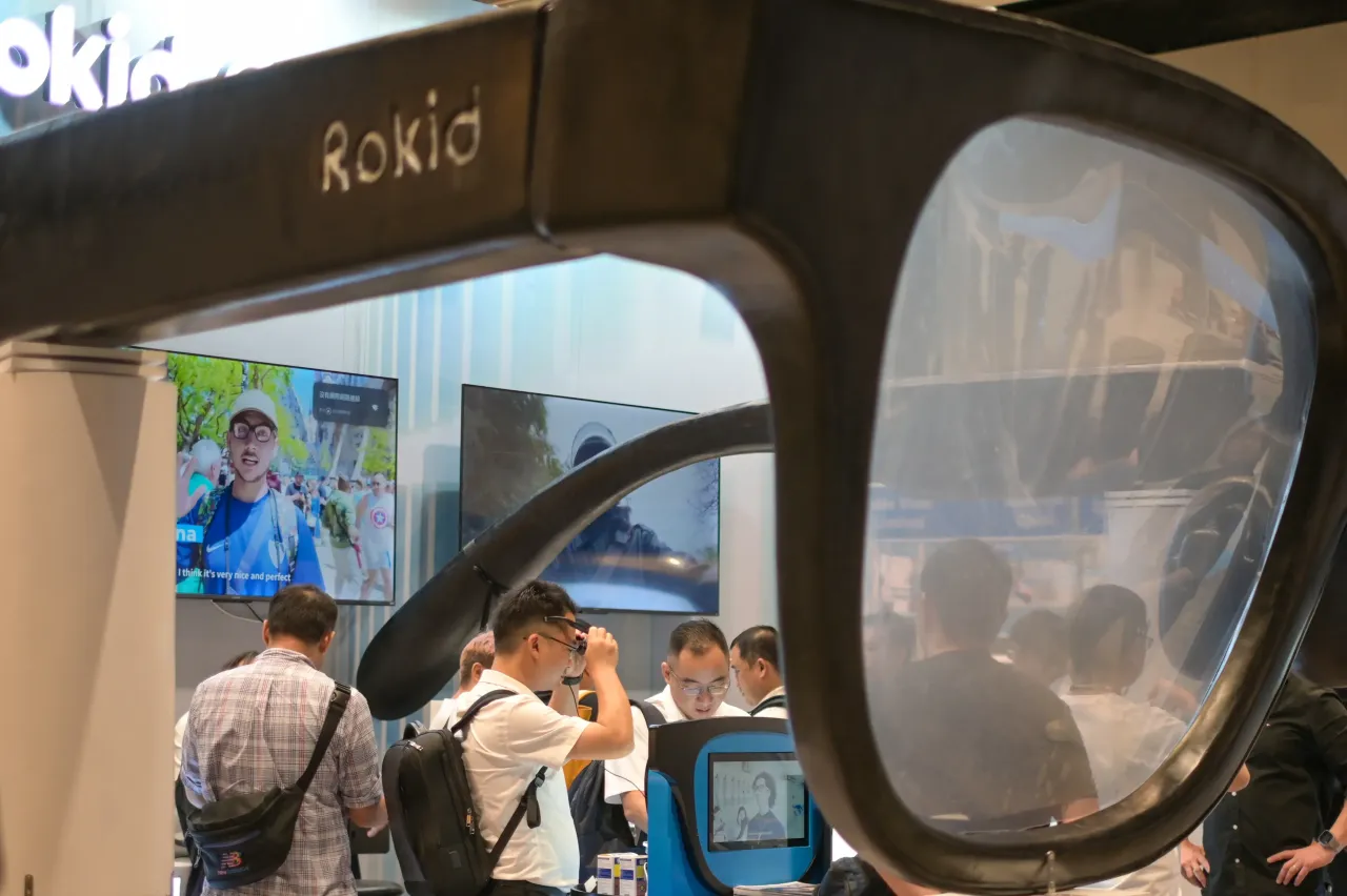People visit the booth of the smart glasses during the Hong Kong Electronics Fair on October 13, 2025 in Hong Kong, China.