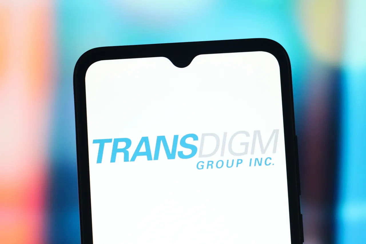 In this photo illustration, the TransDigm Group Incorporated (Trans Digm) logo is seen displayed on a smartphone screen. (Photo Illustration by Thomas Fuller/SOPA Images/LightRocket via Getty Images)