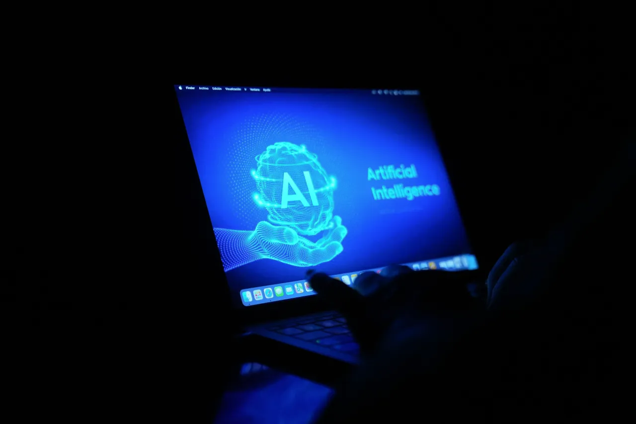 A computer with the acronym AI for Artificial Intelligence, on 24 October, 2025 in Barcelona, Catalonia, Spain.