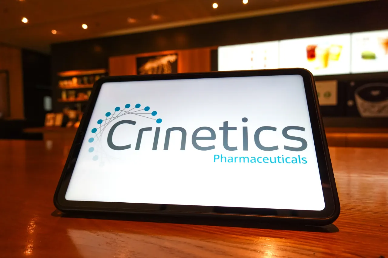 In this photo illustration, the Crinetics Pharmaceuticals logo is seen displayed on the screen of a tablet. (Photo Illustration by Sheldon Cooper/SOPA Images/LightRocket via Getty Images)