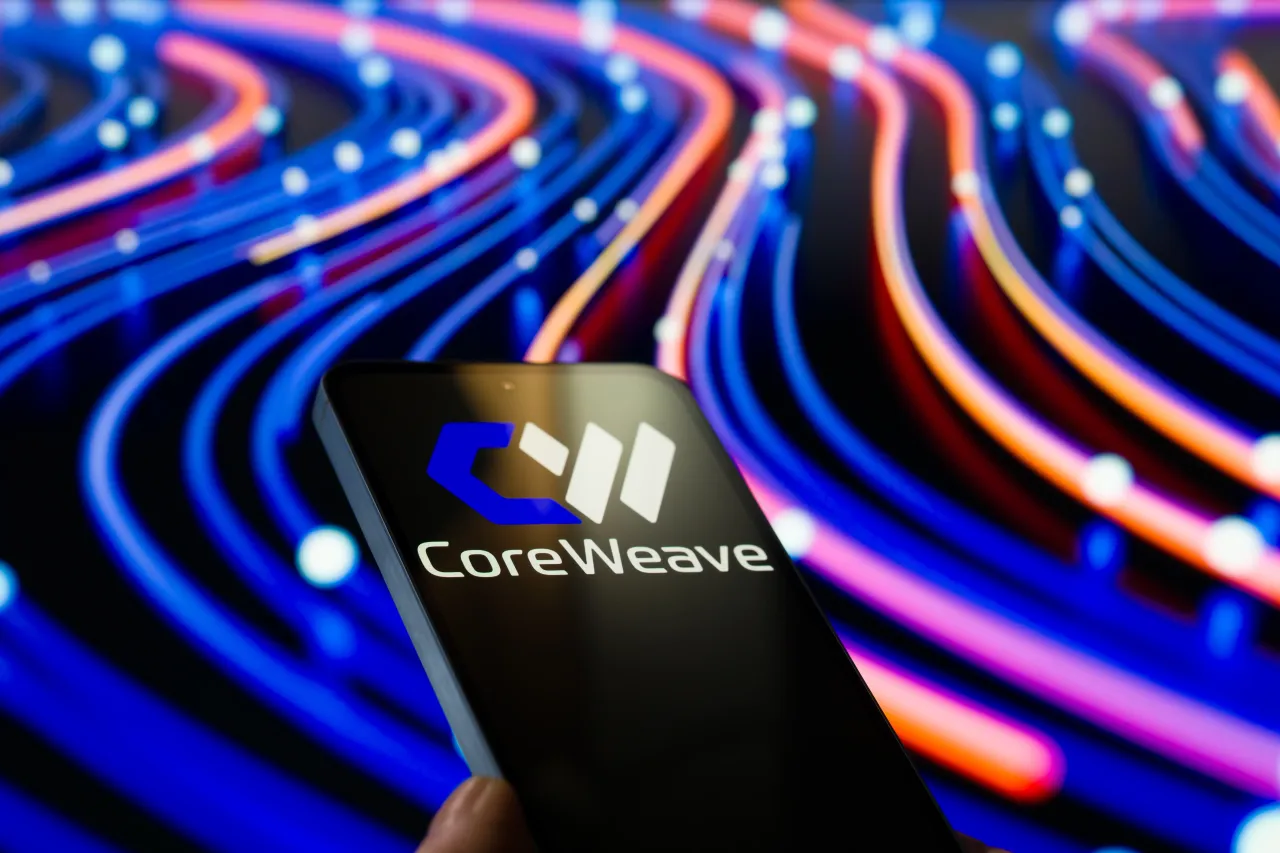 The CoreWeave logo is displayed on a mobile phone in this illustration. (Photo by Jonathan Raa/NurPhoto via Getty Images)