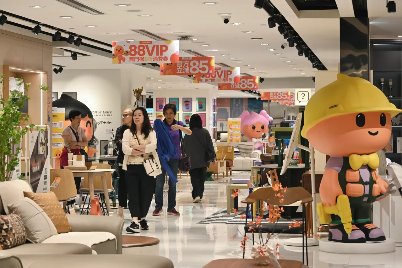Customers shop at Taobao store on on November 11, 2025 in Hong Kong, China. (Photo by Li Zhihua/China News Service/VCG via Getty Images)