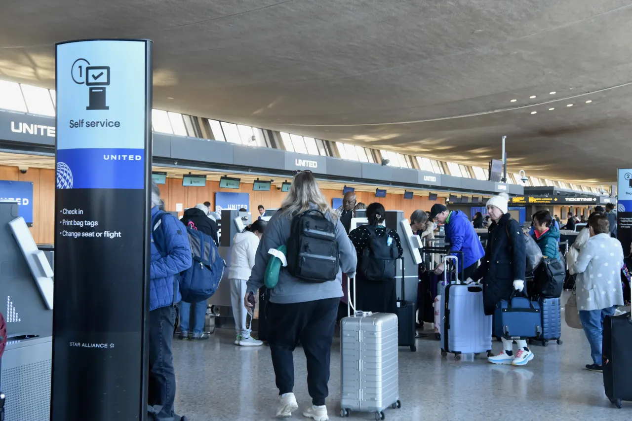 Passengers walk at Dulles International Airport on November 12, 2025 in Washington, DC. 
