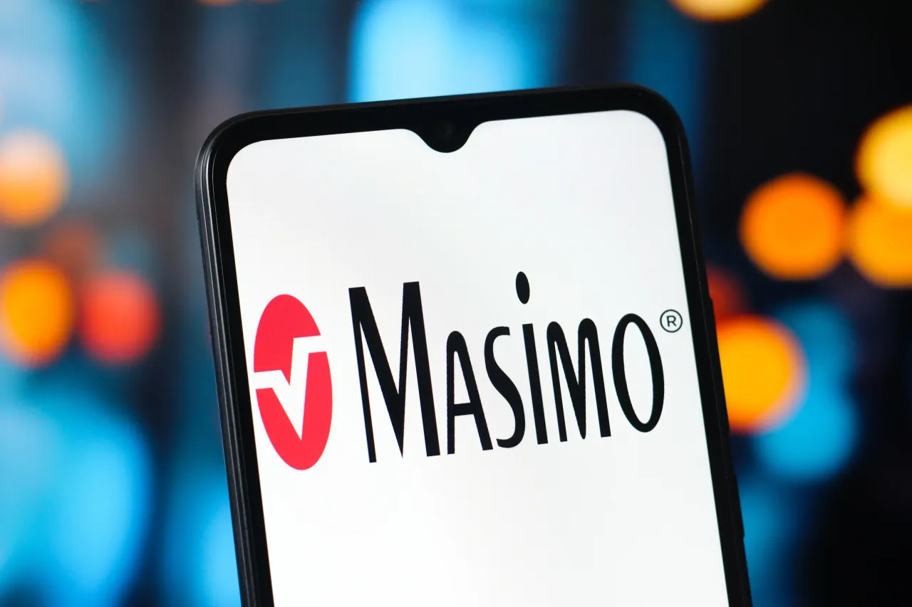 The Masimo Corp logo is seen displayed on a smartphone screen. (Photo Illustration by Thomas Fuller/SOPA Images/LightRocket via Getty Images)