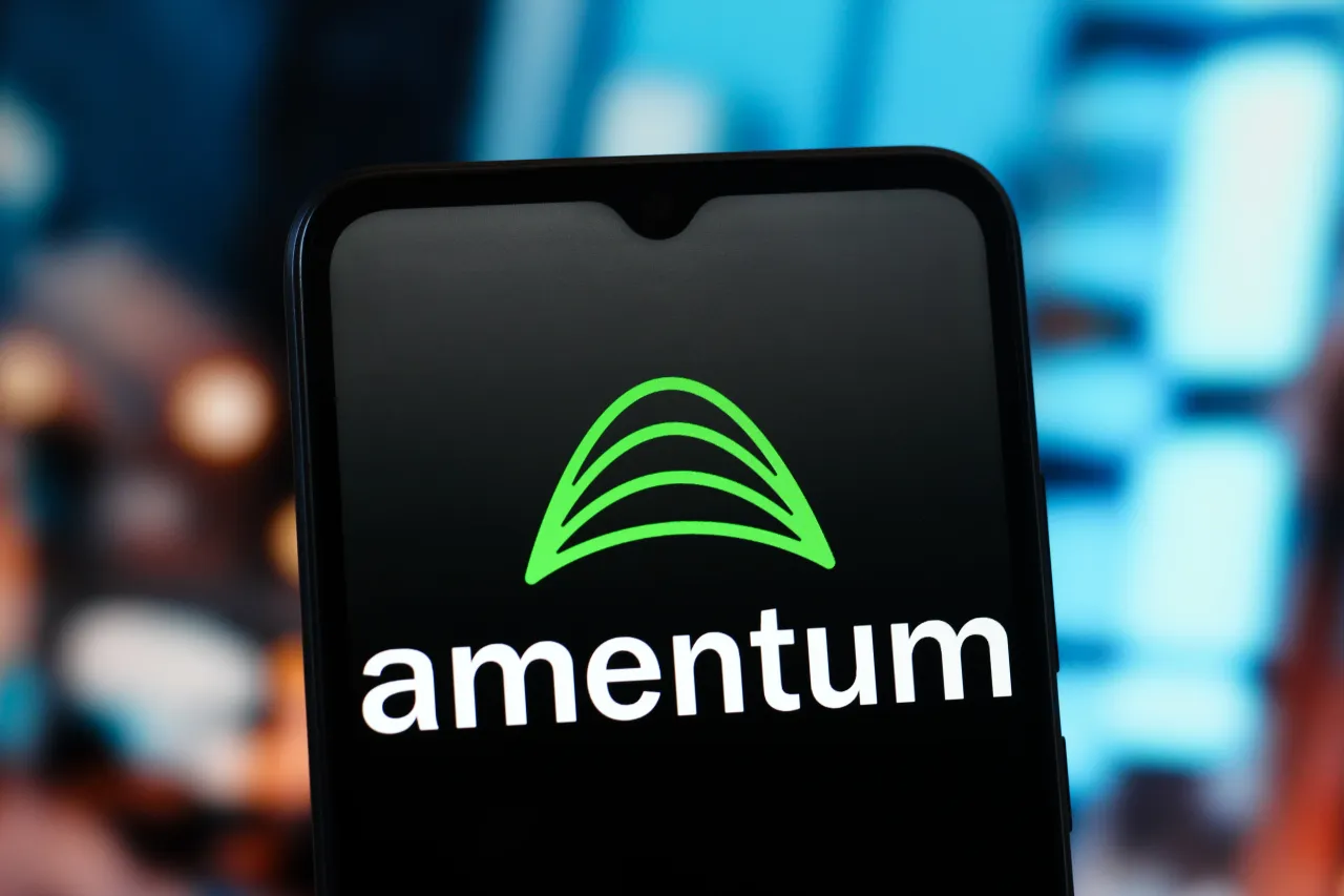  In this photo illustration, the Amentum Holdings logo is seen displayed on a smartphone screen. (Photo Illustration by Thomas Fuller/SOPA Images/LightRocket via Getty Images)