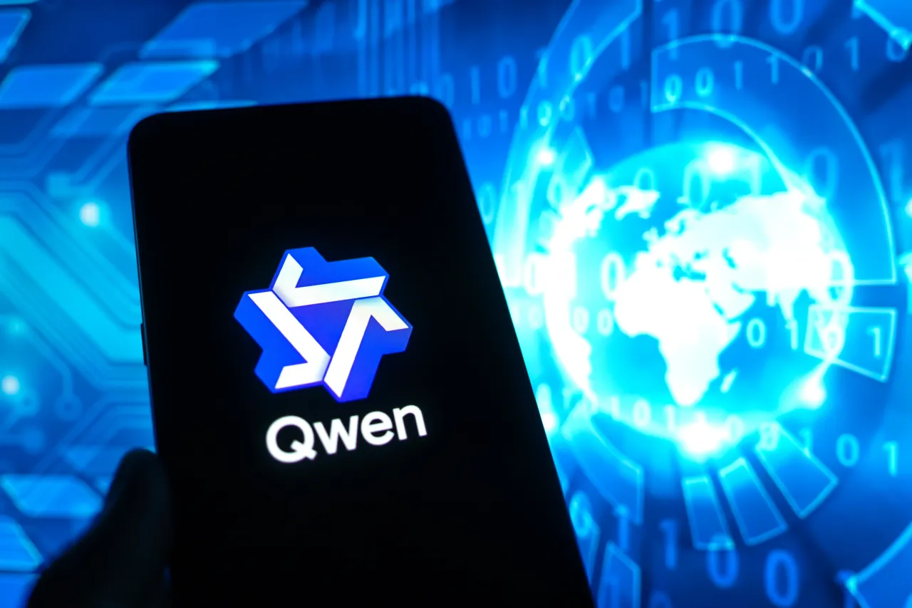 The logo of chatbot app Qwen is displayed on a smartphone screen. (Photo by Qin Zihang/VCG via Getty Images)