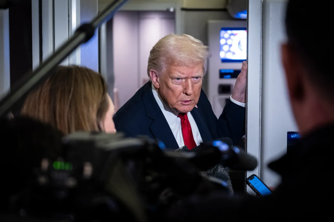President Donald Trump speaks to the media aboard Air Force One on November 25, 2025. (Photo by Pete Marovich/Getty Images)