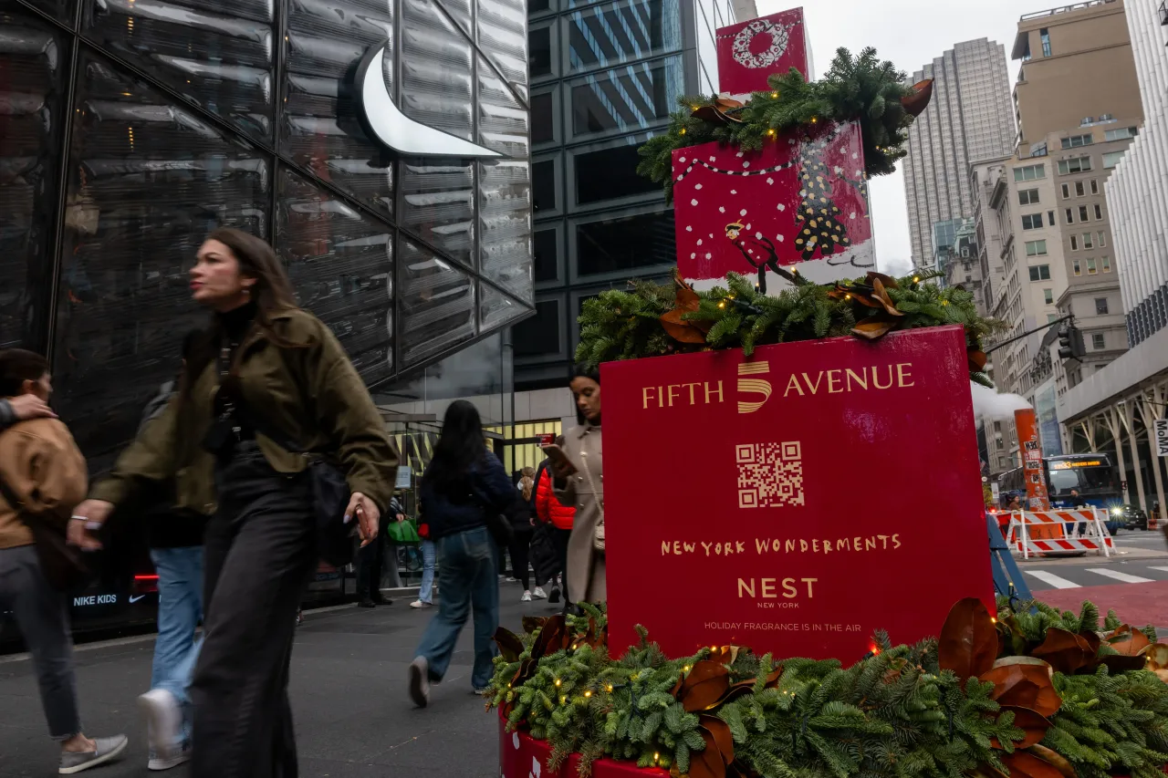 Holiday crowds begin to gather in a shopping district at Rockefeller Center on the afternoon before Thanksgiving on November 26, 2025, in New York City. (Photo by Spencer Platt/Getty Images)