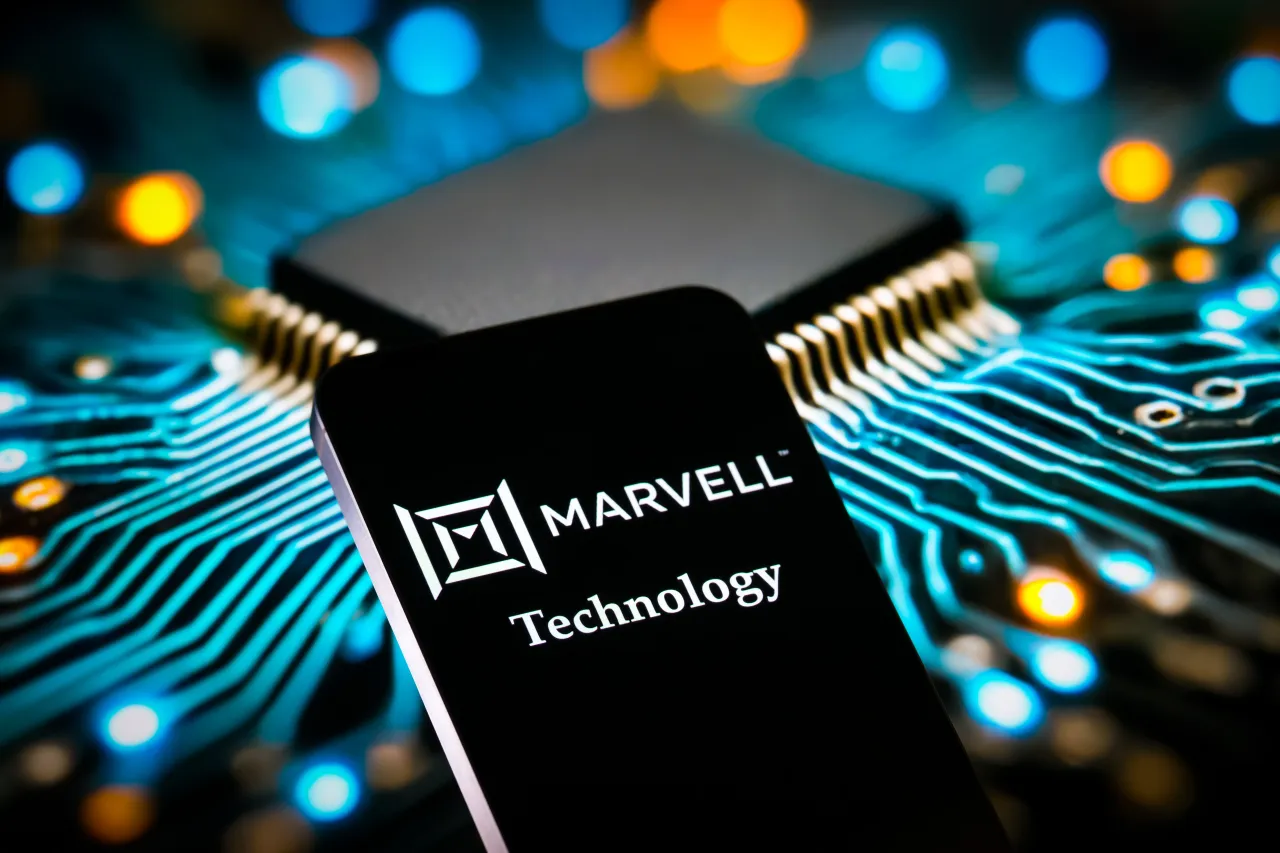 The Marvell Technology logo is displayed on a mobile phone with a visual digital background in this photo illustration.