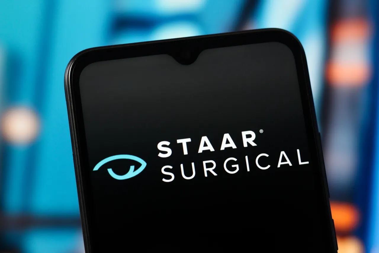 In this photo illustration, the Staar Surgical logo is seen displayed on a smartphone screen. (Photo Illustration by Thomas Fuller/SOPA Images/LightRocket via Getty Images)