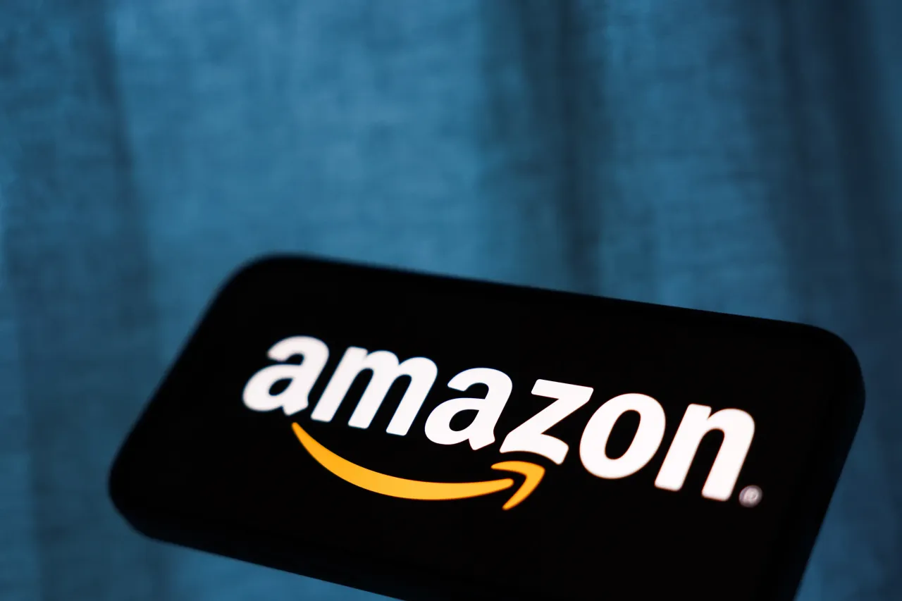 Amazon logo displayed on a phone screen is seen in this illustration photo taken in Krakow, Poland.