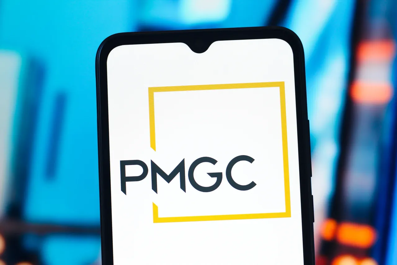 In this photo illustration, the PMGC Holdings logo is seen displayed on a smartphone screen.