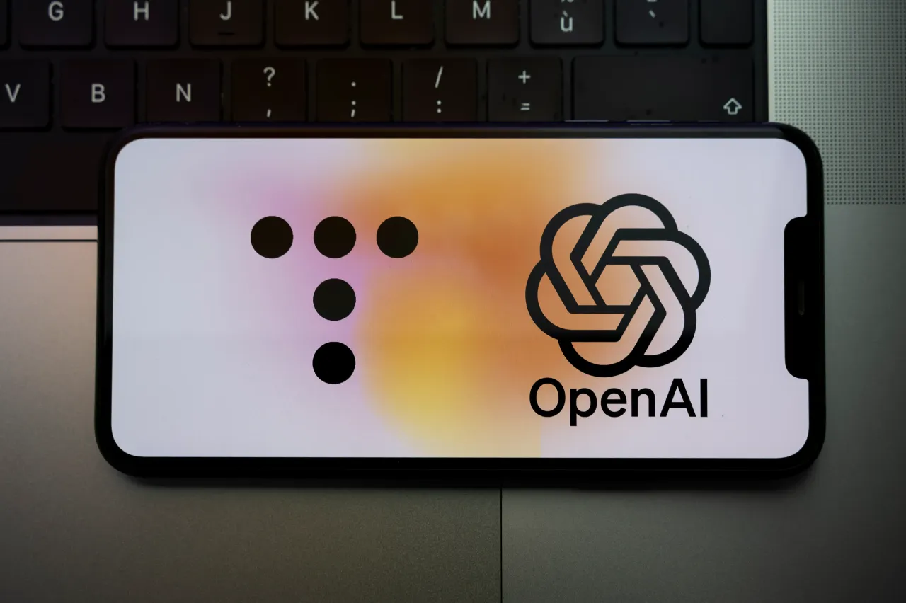 The OpenAI logo is displayed on a smartphone screen in this photo illustration. (Photo Illustration by Thomas IllustrationFuller/NurPhoto via Getty Images)