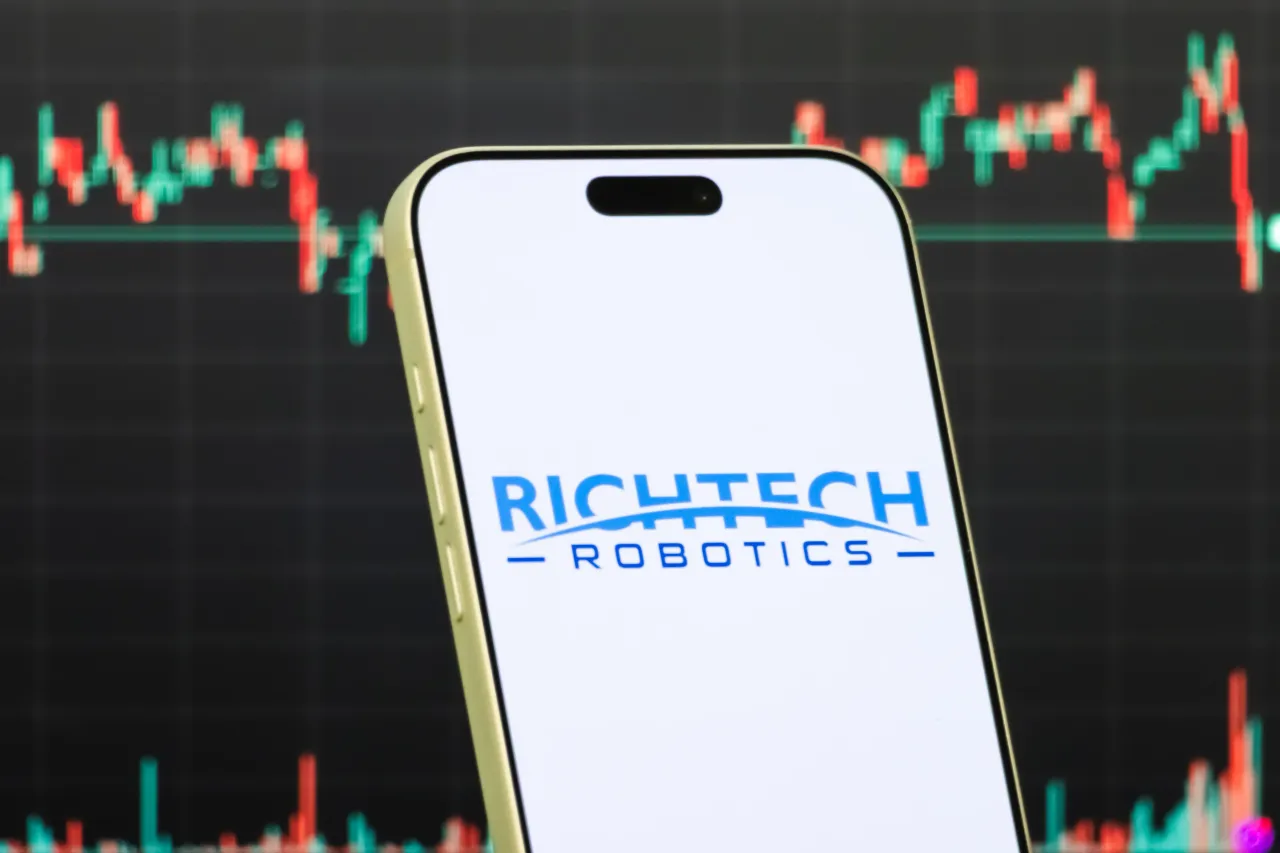 A smartphone displays the logo of Richtech Robotics Inc. (Photo illustration by Cheng Xin/Getty Images)