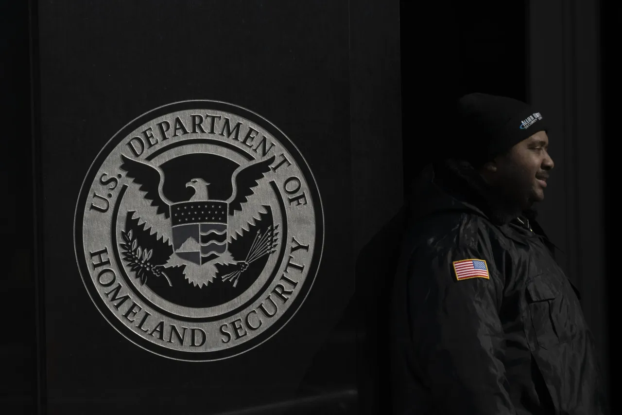 FEBRUARY 11: A security guard is seen next to the logo of the U.S. Department of Homeland Security (Photo by Celal Gunes/Anadolu via Getty Images)