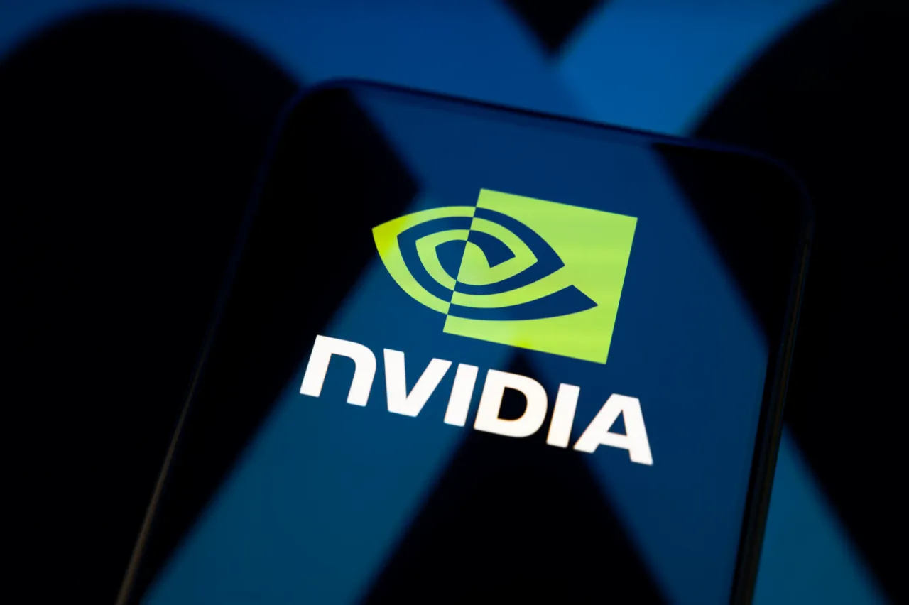 The Nvidia logo appears on a smartphone screen. (Photo by Samuel Boivin/NurPhoto via Getty Images)