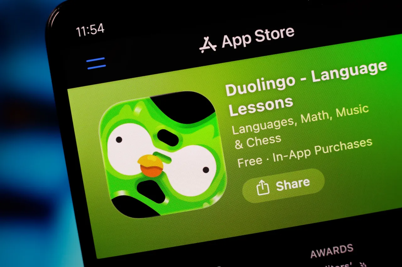 The Duolingo logo appears on a smartphone screen in the Apple app store in this photo illustration in Ontario, Canada, on February 22, 2026.