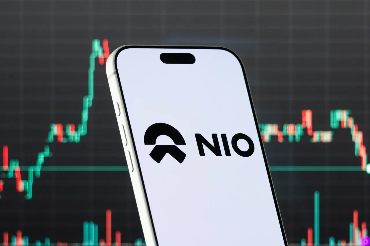 A smartphone displays the logo of NIO Inc. (Photo illustration by Cheng Xin/Getty Images)