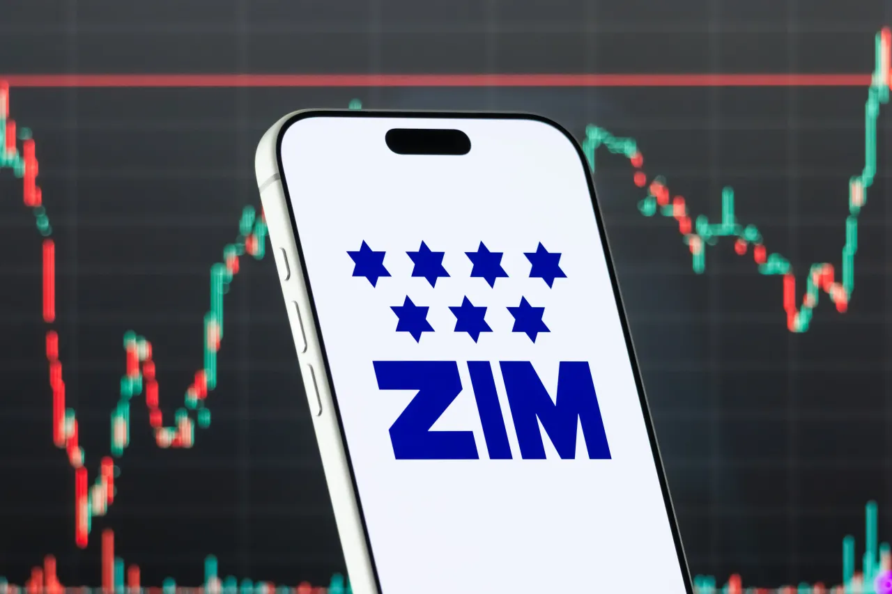 A smartphone displays the logo of ZIM Integrated Shipping Services Ltd. (Photo illustration by Cheng Xin/Getty Images)