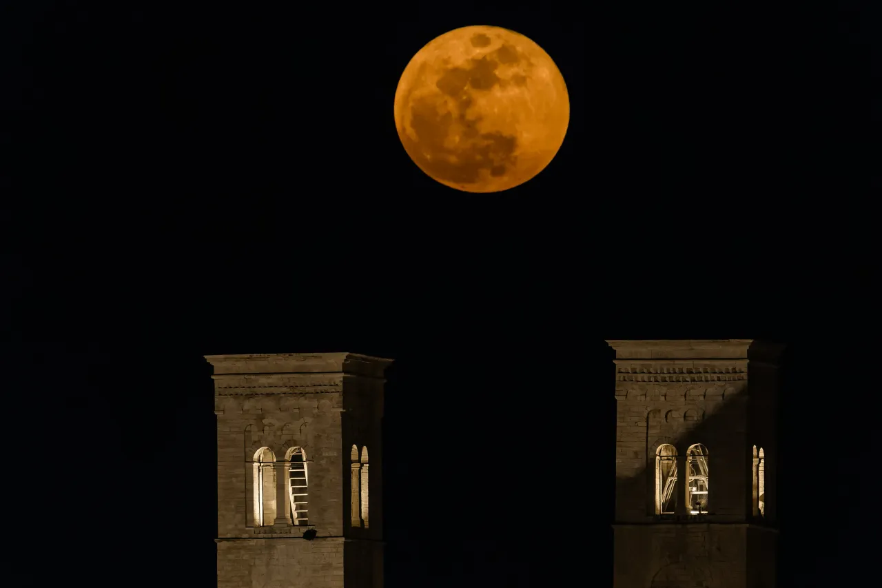 A Blood Moon appears over the towers of Molfetta Cathedral in Molfetta, Italy, on March 3, 2026.  (Photo by Davide Pischettola/NurPhoto via Getty Images)