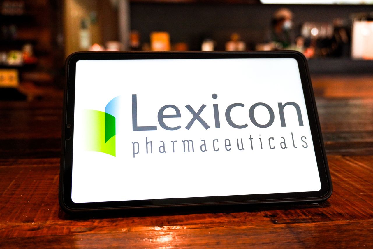 In this photo illustration, the Lexicon Pharmaceuticals logo is displayed on the screen of a smart tablet. (Photo Illustration by Sheldon Cooper/SOPA Images/LightRocket via Getty Images)