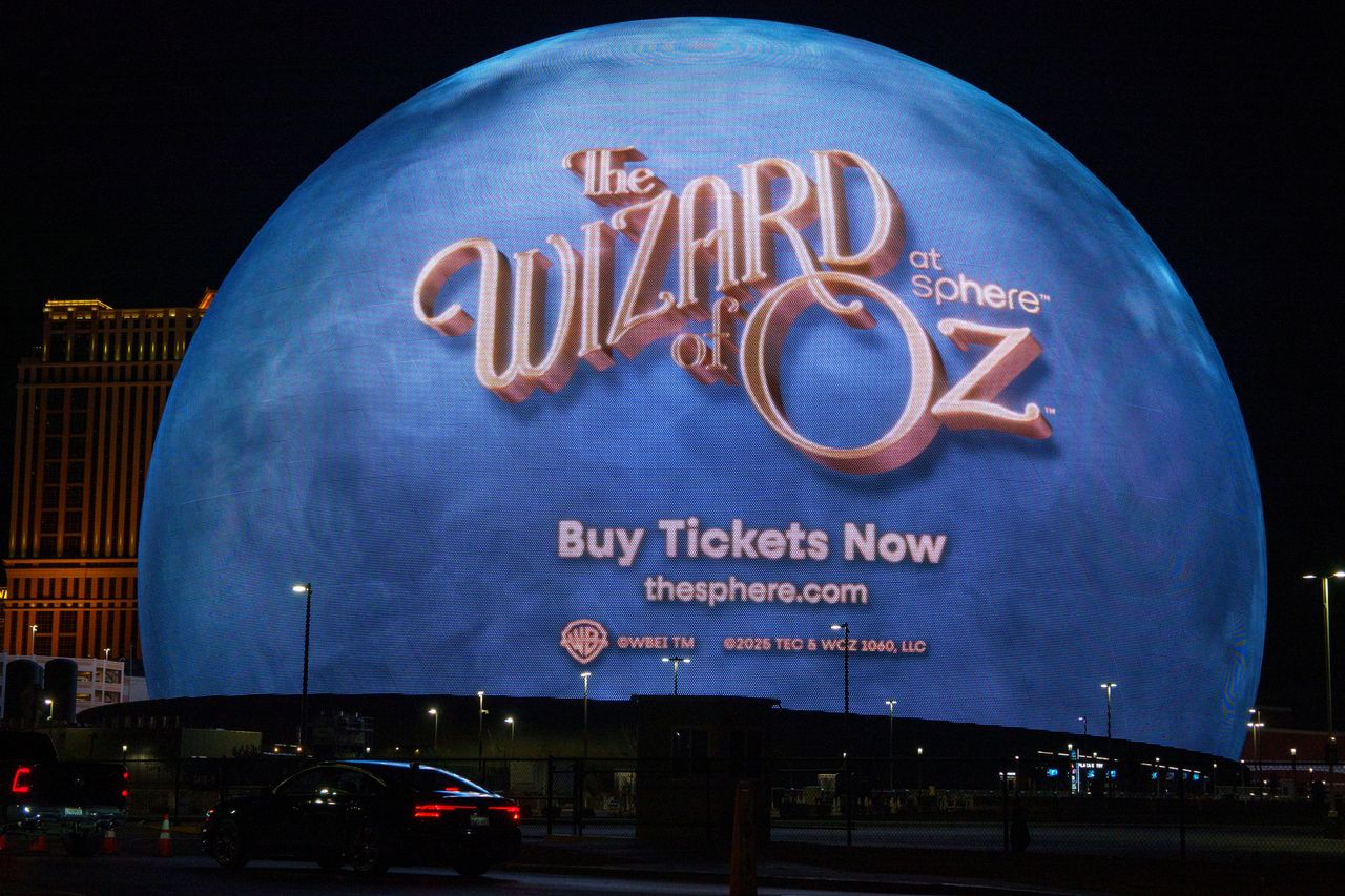 An advertisement for Wizard of Oz at Sphere is displayed on the Sphere.