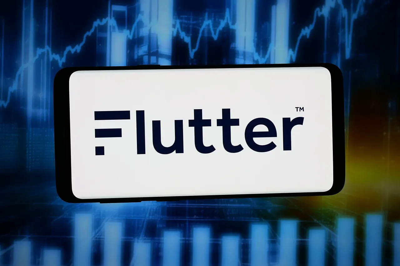 In this photo illustration, the logo of gambling company Flutter Entertainment plc is displayed on a smartphone.