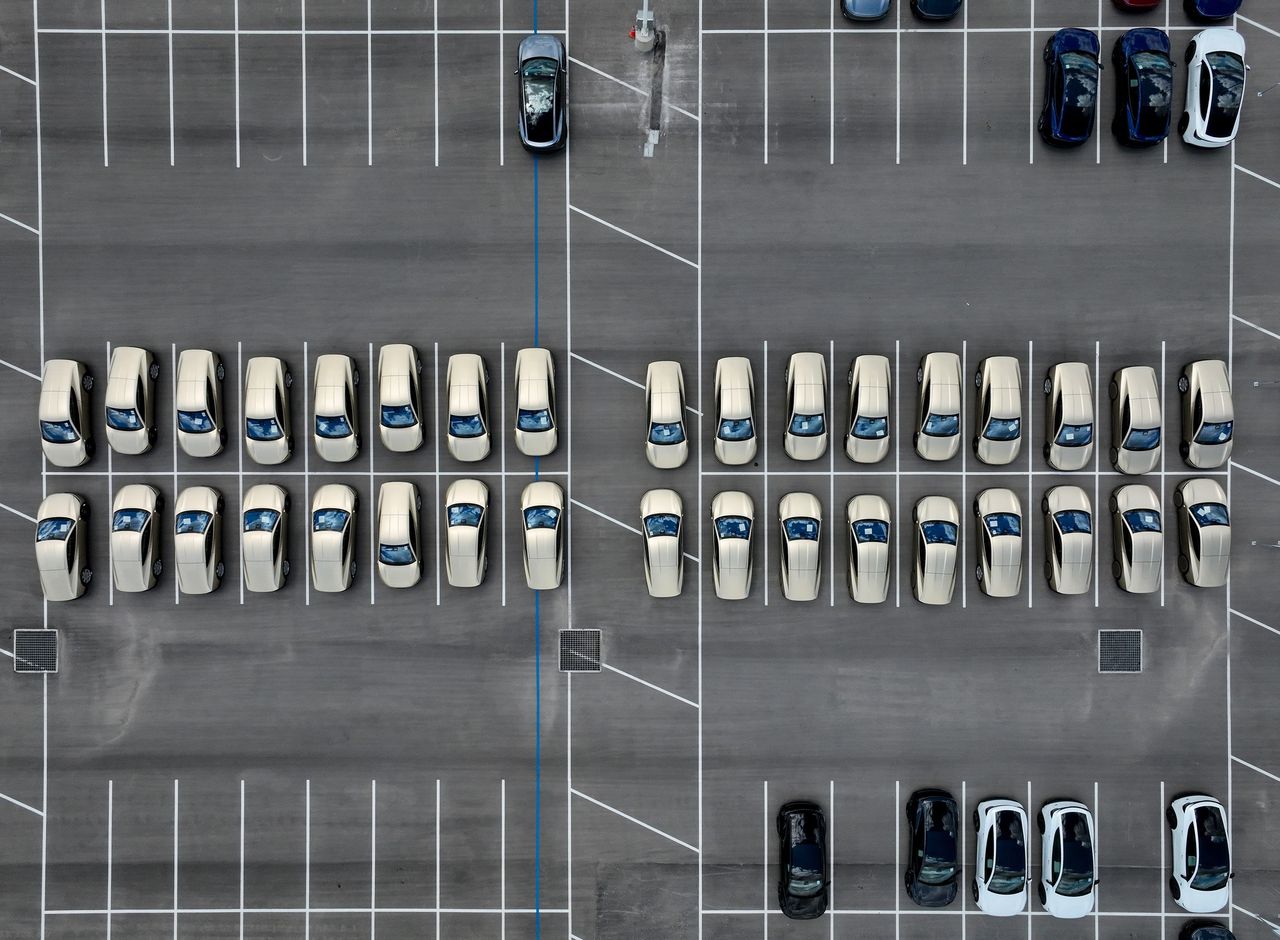 Tesla Cybercabs are lined up on a lot at Tesla Giga Texas in Austin, Wednesday, April 8, 2026. (Jay Janner/The Austin American-Statesman via Getty Images)