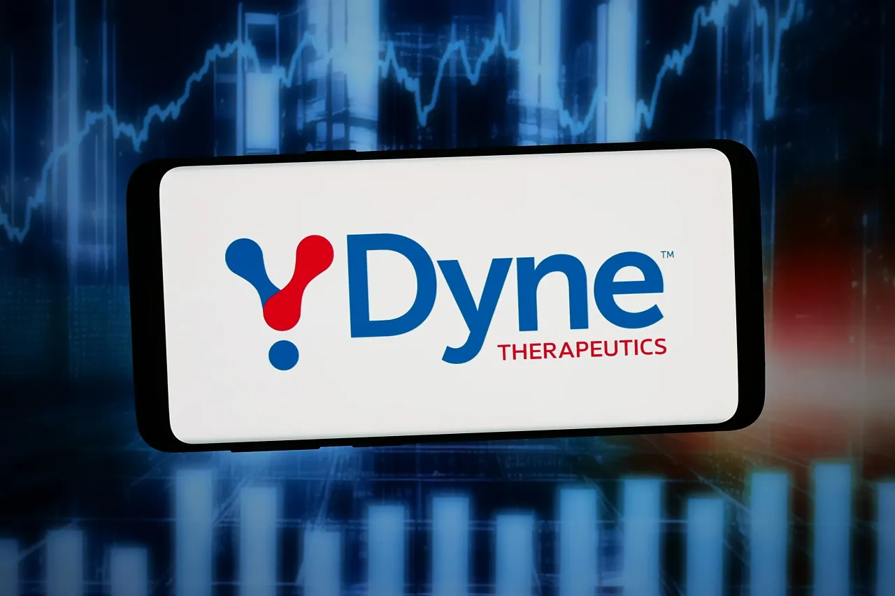 In this photo illustration, the logo of US biotech company Dyne Therapeutics Inc. is displayed on a smartphone in front of abstract background on computer screen. (Photo Illustration by Timon Schneider/SOPA Images/LightRocket via Getty Images)