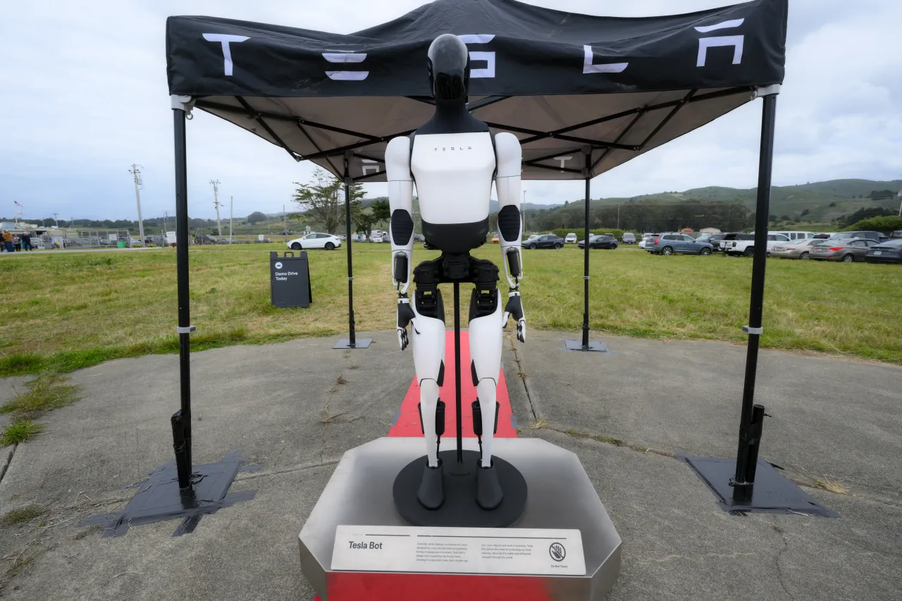 A view of Tesla Optimus or Tesla Bot is seen at the 32nd Annual Pacific Coast Dream Machines show at a field of Half Moon Bay Airport in Half Moon Bay, California, United States on April 26, 2026. (Photo by Tayfun Coskun/Anadolu via Getty Images)