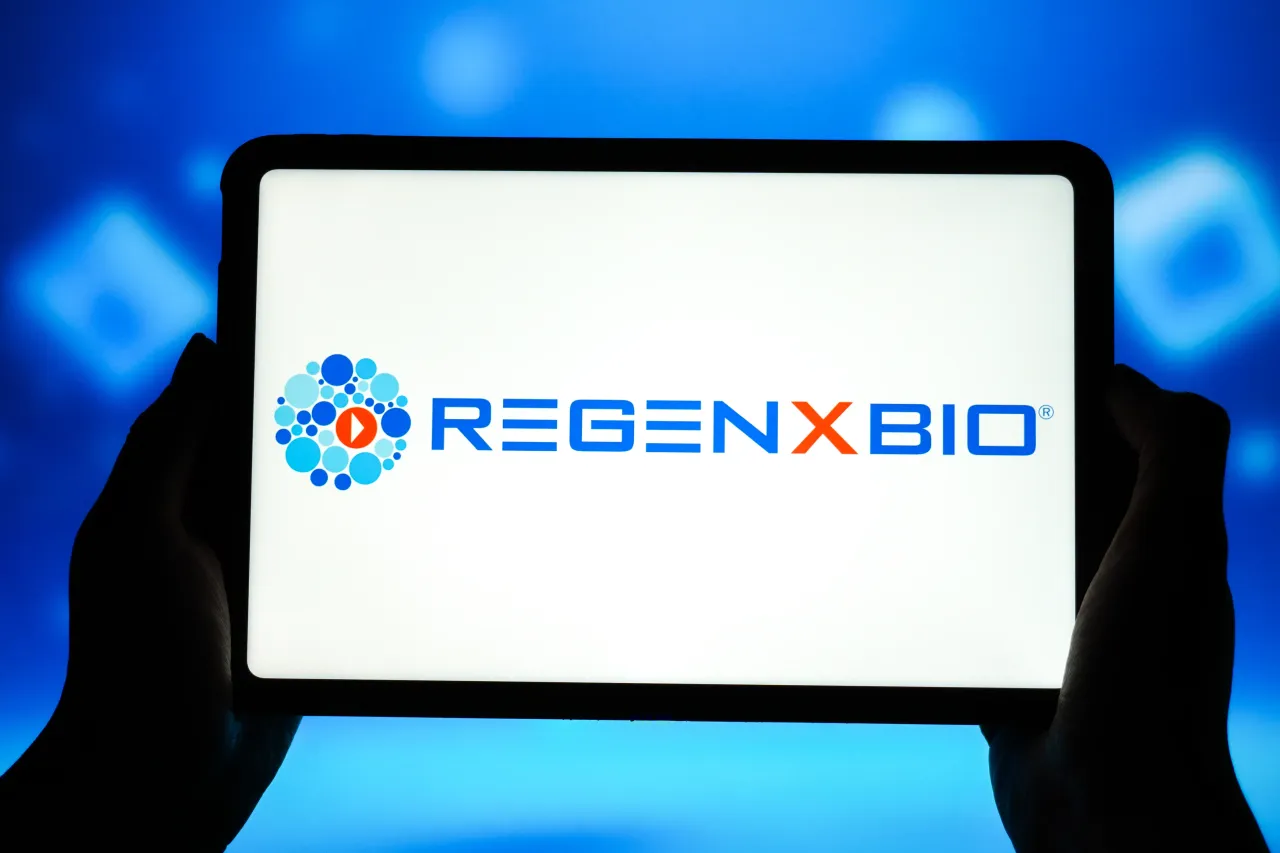 In this photo illustration, the Regenxbio logo is displayed on the screen of a smart tablet. (Photo Illustration by Sheldon Cooper/SOPA Images/LightRocket via Getty Images)