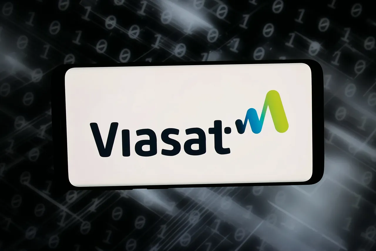 The logo of US communications company Viasat Inc. is displayed on a smartphone. (Photo Illustration by Timon Schneider/SOPA Images/LightRocket via Getty Images)
