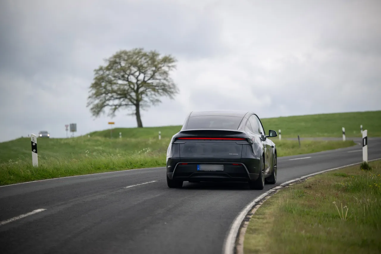 A self-driving Tesla Model Y is driving autonomously on the roads of the Eifel. Photo: Harald Tittel/dpa (Photo by Harald Tittel/picture alliance via Getty Images)