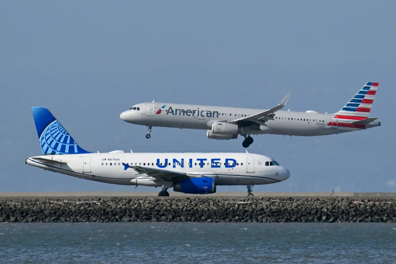 A United Airlines plane and an American Airlines plane at San Francisco International Airport. (Photo by Tayfun Coskun/Anadolu via Getty Images)