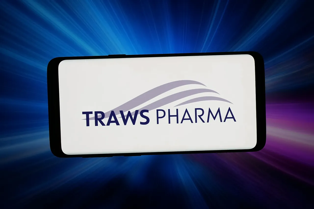 In this photo illustration, the logo of biopharma company Traws Pharma Inc. is displayed on a smartphone in front of abstract background on computer screen. (Photo Illustration by Timon Schneider/SOPA Images/LightRocket via Getty Images)