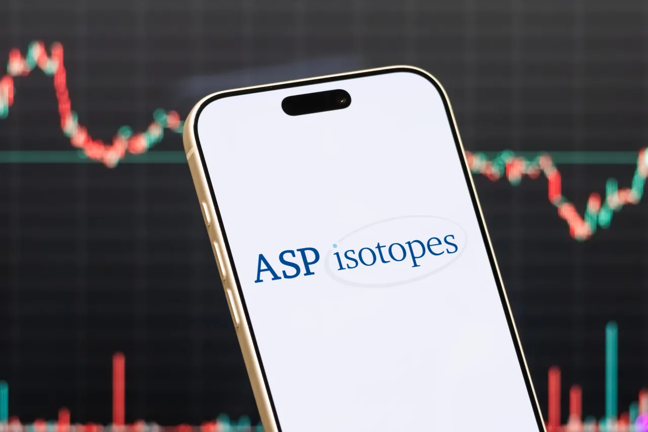 A smartphone displays the logo of ASP Isotopes Inc. (Photo illustration by Cheng Xin/Getty Images)