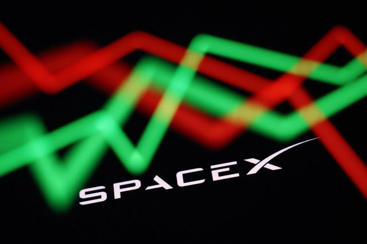 An illustrative stock graph displayed on a laptop screen and SpaceX logo displayed on a phone screen are seen in this multiple exposure illustration photo taken in Krakow, Poland on June 1, 2026. (Photo by Jakub Porzycki/NurPhoto via Getty Images)