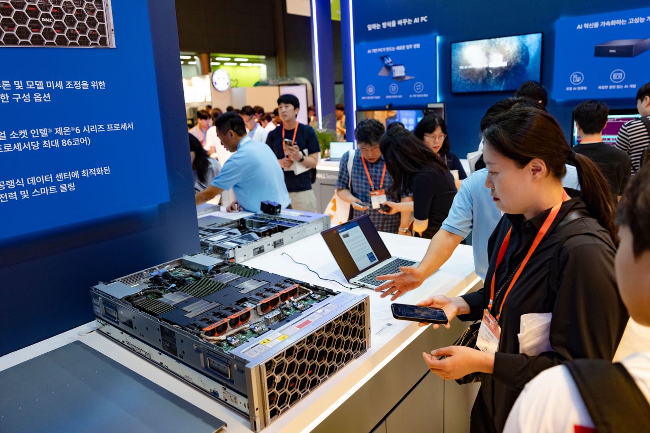 Visitors at the Dell Technologies booth reviewing the PowerEdge XE7740 server during COEX in Seoul, South Korea, on June 10, 2026. (Photo by Chris Jung/NurPhoto via Getty Images)