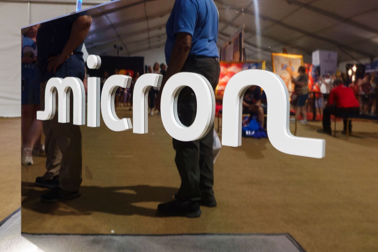 The Micron Technology logo is displayed at a booth at The Great American State Fair on the National Mall on July 2, 2026 in Washington, DC. (Photo by Kevin Carter/Getty Images)
