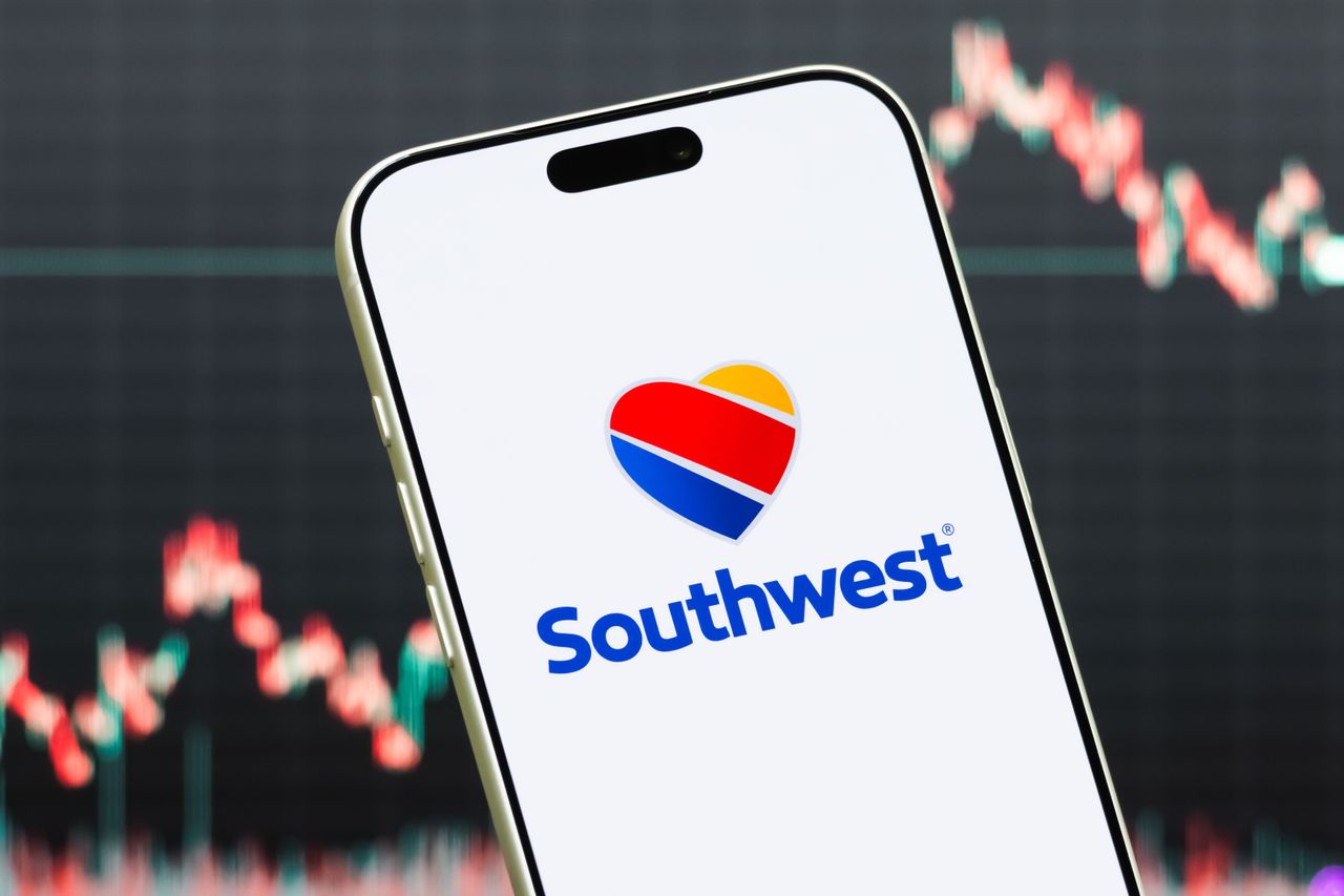  In this photo illustration, a smartphone displays the logo of Southwest Airlines Co.