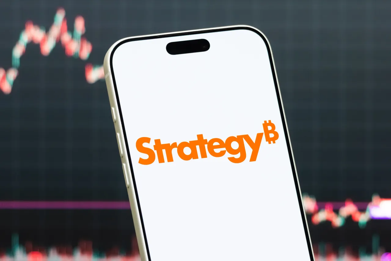 Strategy Logo Shown on Smartphone with Latest Stock Market Chart. (Photo illustration by Cheng Xin/Getty Images)