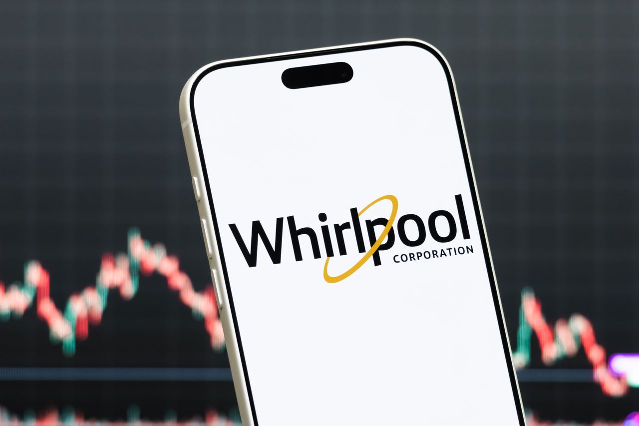 In this photo illustration, a smartphone displays the logo of Whirlpool Corporation.