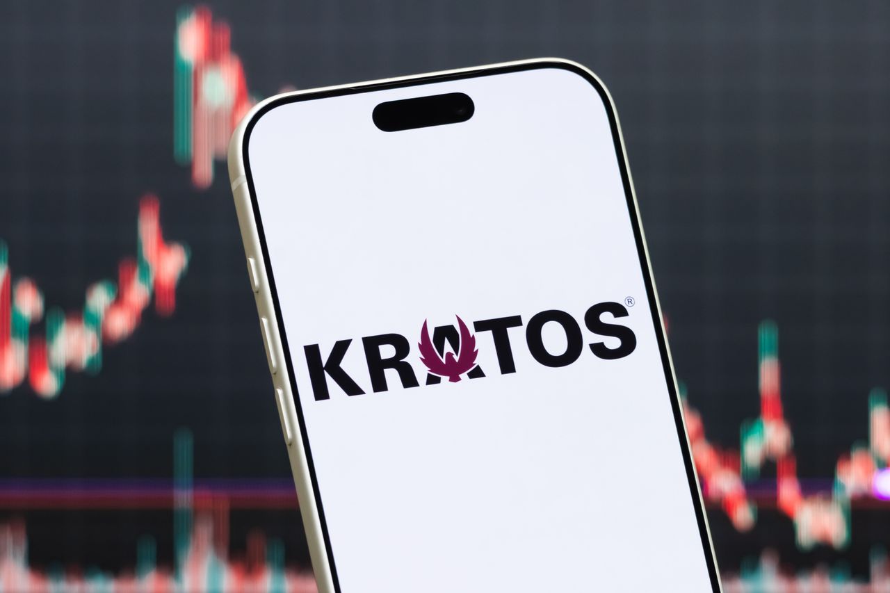 In this photo illustration, a smartphone displays the logo of Kratos Defense & Security Solutions, Inc.