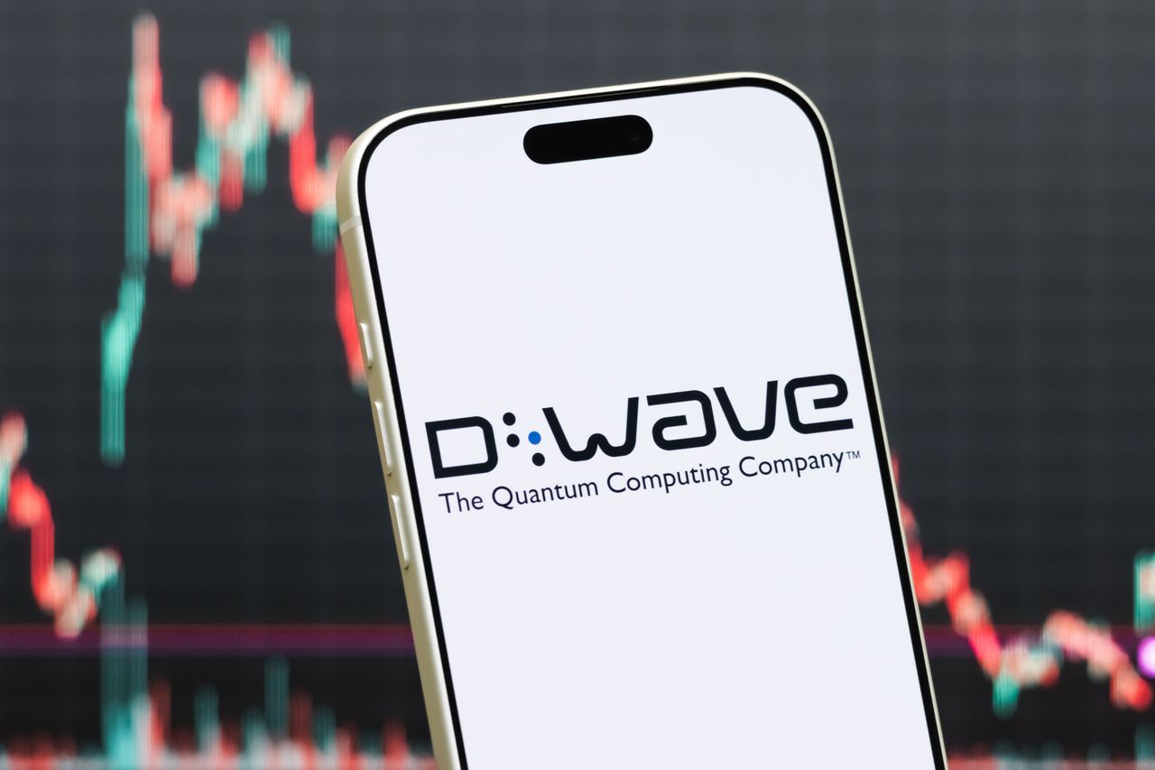 In this photo illustration, a smartphone displays the logo of D-Wave Quantum Inc.