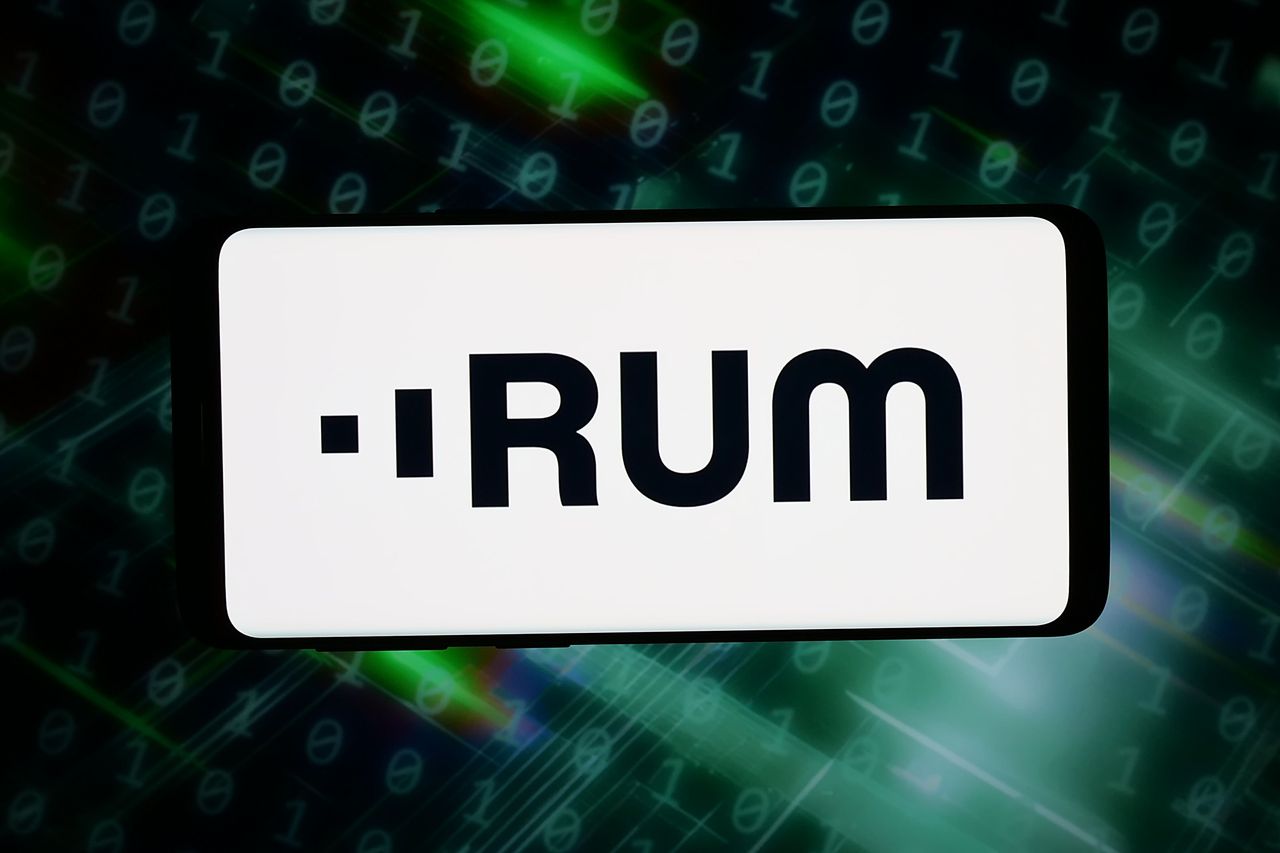In this photo illustration, the logo of US holding company RUM Group Inc. (Rumble) is displayed on a smartphone.