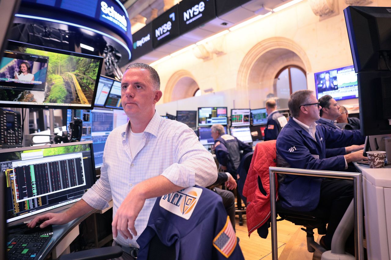 Traders work on the floor of the New York Stock Exchange during morning trading on August 05, 2026. (Photo by Michael M. Santiago/Getty Images)