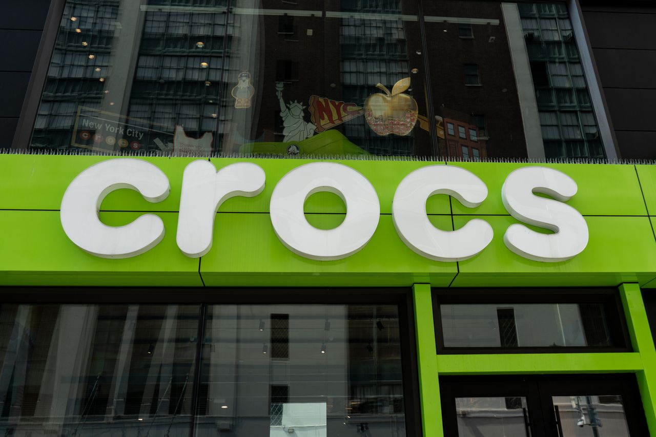A Crocs logo sign is seen in New York City, United States.